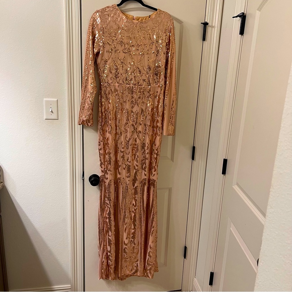 New!! Never worn‼️‼️Beautiful Peach shiny Ballgown for sale!